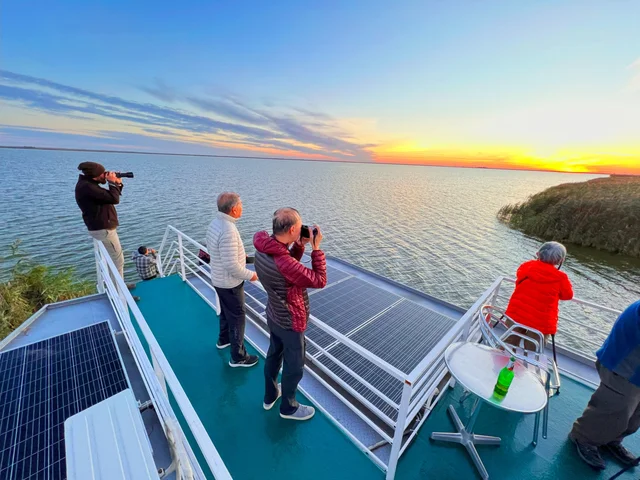 Sunset birdwatching from the floating hotel deck in the Danube Delta